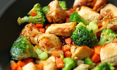 Pan of chicken, garlic and carrot stir fry in a honey garlic sauce